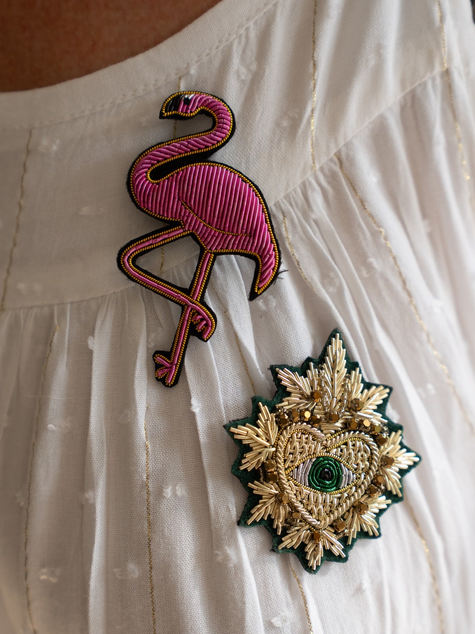 Détail de la broche Flamingo